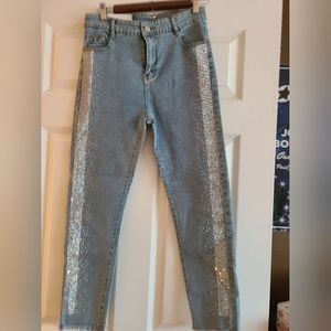 Denim jeans with rhinestone accents